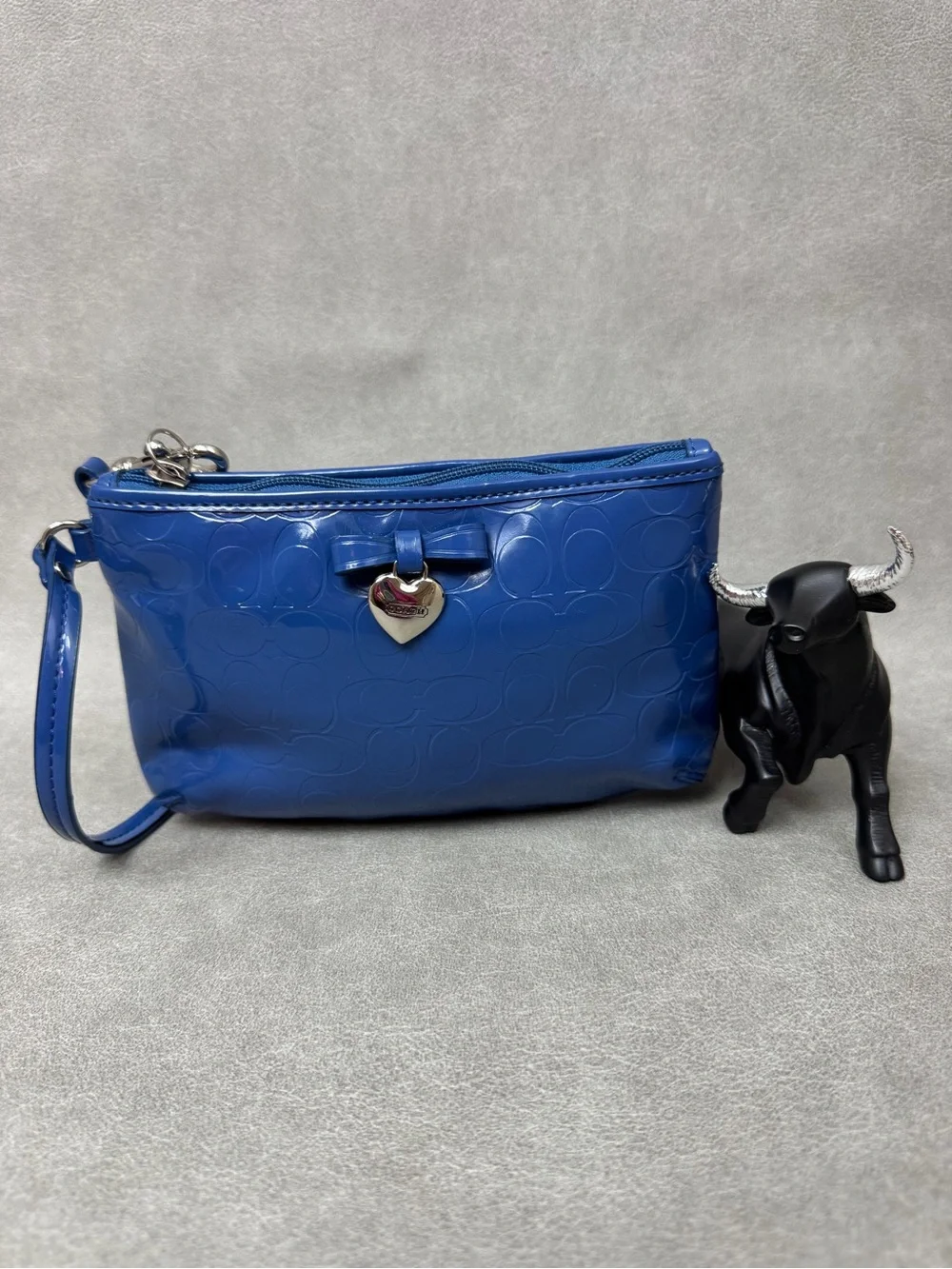 Coach Poppy blue embossed patent leather wristlet